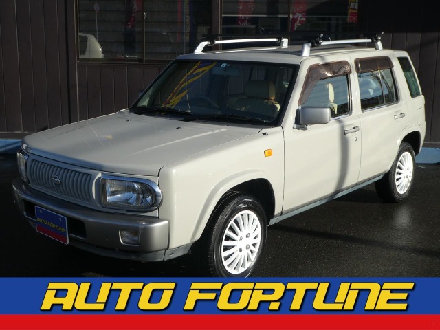 中古車 日産 ラシーン 1 5 タイプii 4wd 4wd 革調シートカバー 背面タイヤ の中古車詳細 141 309km ベージュ 千葉県 69 8万円 中古車情報 中古車検索なら 車選びドットコム 車選び Com