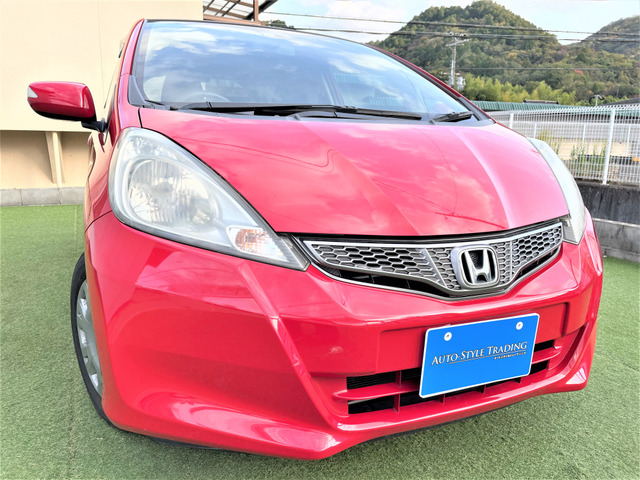 中古車 ホンダ フィット 1 3 G 10thアニバーサリー 純正ナビ 地デジtv スマートキー の中古車詳細 55 000km ミラノレッド 大阪府 28 3万円 中古車情報 中古車検索なら 車選びドットコム 車選び Com