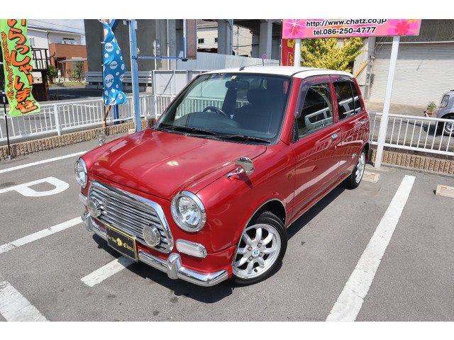 中古車 ダイハツ ミラジーノ ミニライトスペシャル エアロ 純14AW 純