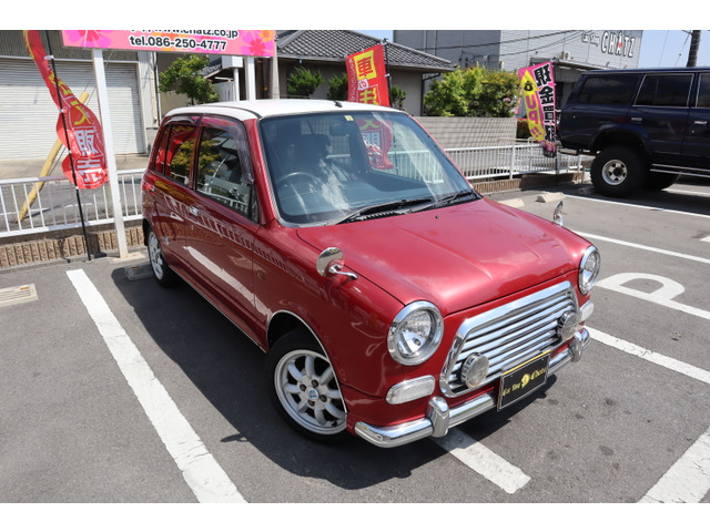 中古車 ダイハツ ミラジーノ ミニライトスペシャル エアロ 純14AW 純