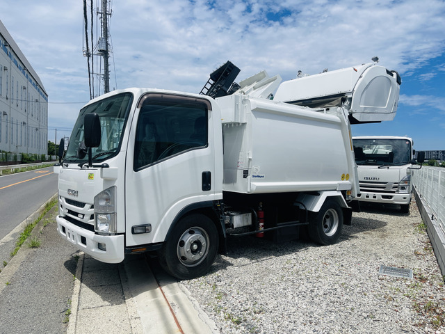 エルフ  塵芥車プレス式6.2立米汚水タンク付