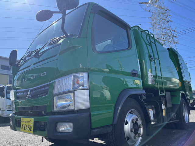 キャンター  3.35t積み巻込み式パッカー車5立米