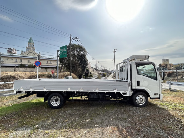 いすゞ エルフ 平ボディ ワイド 超ロング 6MT の中古車詳細 (193,800km