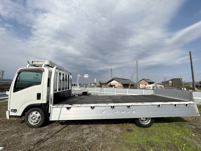 いすゞ エルフ 平ボディ ワイド 超ロング 6MT の中古車詳細 (193,800km