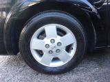 純正15インチアルミホイール。ノーマルタイヤ付き。