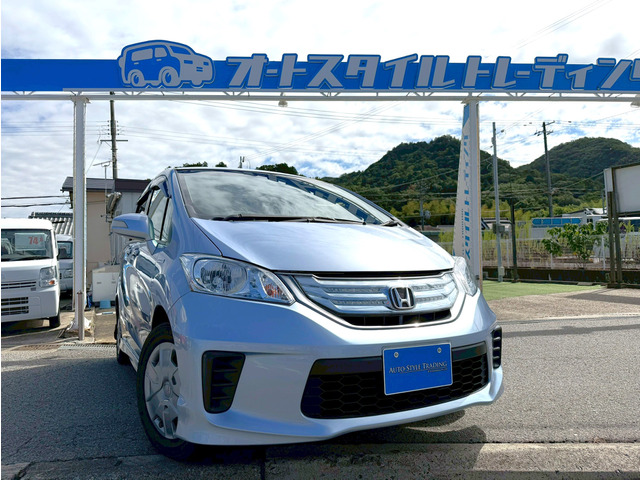 フリードハイブリッド 1.5 ジャストセレクション 3列シート/左側パワスラ/バックカメラ