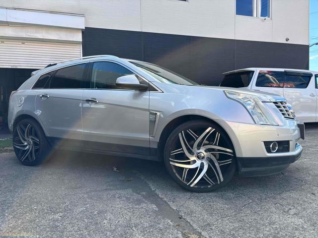 SRXクロスオーバープレミアム 4WD左ハンドル バックカメラパワーシートTV