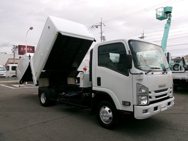 エルフ  4WDダンプ式塵芥車6.5M3新明和