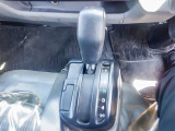 AT