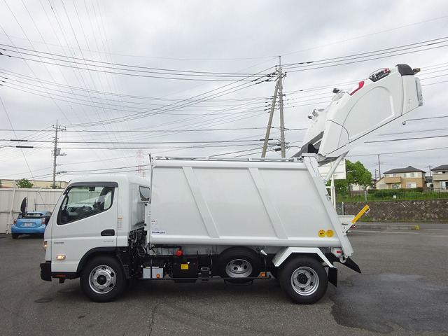 三菱ふそう キャンター 塵芥車 プレス 8.4m3 新明和 汚水タンク付 の