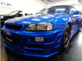 R34スカイラインGT4DセダンR34GTRVスペックNISMO仕様エアロベイサイドブルーカラー&RB20DENEO6エンジン純正5MT&マフラー車高調SSRアルミ他装備充実車が入庫しました