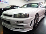 R34GTRVスペックNISMO仕様エアロRB20DENEO6エンジン純正5MTミッション専用2本出しマフラーラルグスRG車高調レッドキャリパ19アルミHIDライトクリアウインカーTベルト交換済