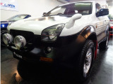 ホワイトカラー専用オーバーフェンダー6VD13.2V6エンジンTODセレクト4WDステンマフラーPROCOMPサスWEDSアルミマットガード赤黒レザーレカロシートナビバックカメラLEDライトRスポイラ