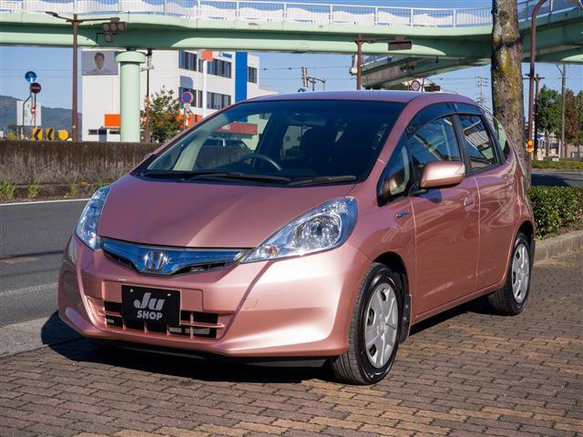 中古車 ホンダ フィットハイブリッド 1 3 シーズ 67 000km ピンク 高知県 29 8万円 中古車情報 中古 車検索なら 車選びドットコム 車選び Com