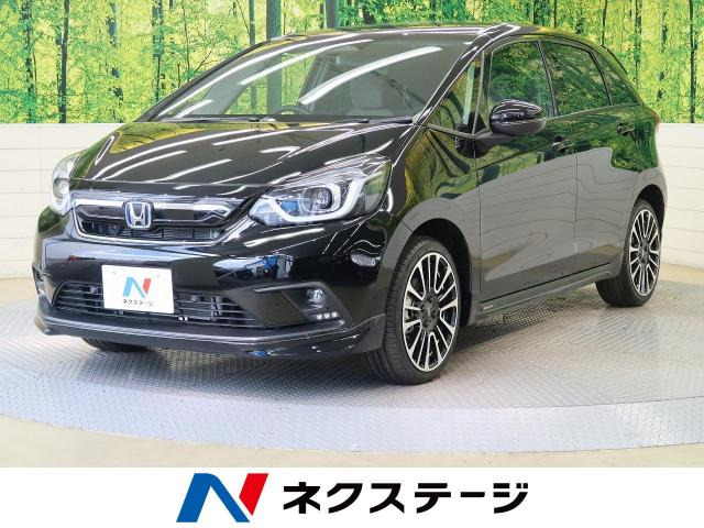 中古車 ホンダ フィット 1 5 E Hev ホーム の中古車詳細 登録済未使用車 9km走行 クリスタルブラック パール 滋賀県 9 9万円 中古車情報 中古車検索なら 車選びドットコム 車選び Com