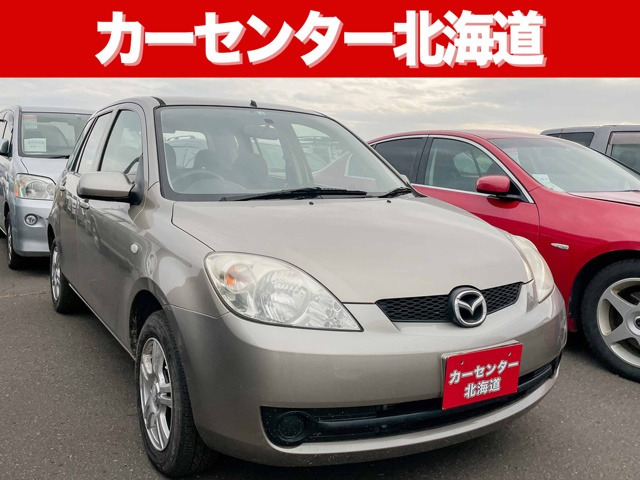 中古車 マツダ デミオ 1 3 カジュアル 1年保証 Mt 寒冷地仕様 禁煙車 の中古車詳細 56 000km ベージュ 北海道 14 8万円 中古車情報 中古車検索なら 車選びドットコム 車選び Com