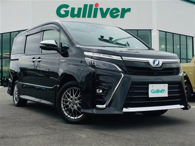 中古車 トヨタ ヴォクシー 1 8 ハイブリッド Zs 煌 修復歴無し の中古車詳細 19 000km イナズマスパーキングブラックガラスフレーク 熊本県 259 8万円 中古車情報 中古車検索なら 車選びドットコム 車選び Com