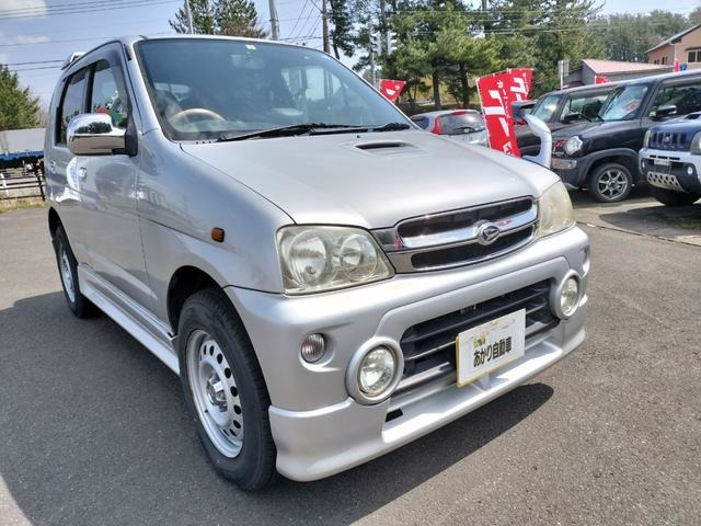 テリオスキッド カスタム X 4WD 