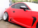 高額パーツを多数装備したカスタムGR86の入庫!TRDフルエアロを装着しGRAESDampers、WORK VS18AW、ワンオフマフラーなどの高額パーツに加え、トヨタ9インチSD地デジナビなど充実装備の一台