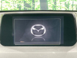 【BOSEサウンド付マツダコネクトナビ】車内の雰囲気にマッチした一体型タイプのナビ。各種車輌設定やBluetooth再生等、様々な機能が楽しめます。直感的なダイヤル操作が可能で、使い勝手も良好です。