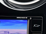 日産純正ナビゲーションMM316D-Wが付いています。