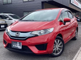 走行距離少ない、赤のフィットハイブリッドお探しの方にお勧め♪ミラノレッドのフィットハイブリッド Lパッケージ入庫しました!