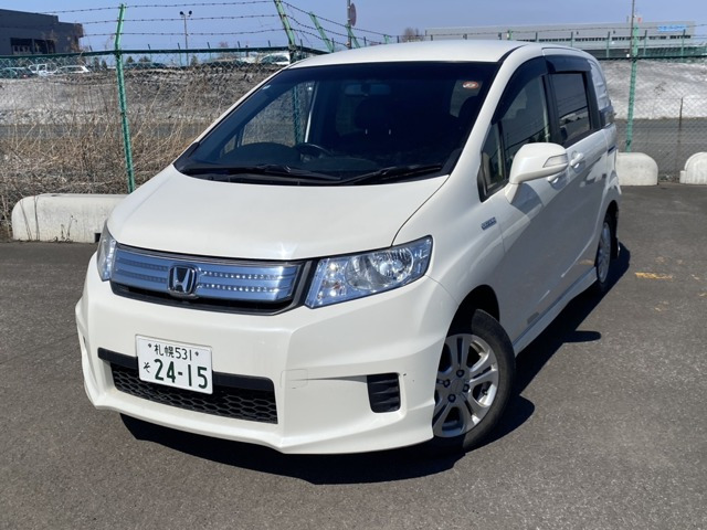 フリードスパイクハイブリッド 1.5 ジャストセレクション 4WD・純正ナビ・両側パワー...