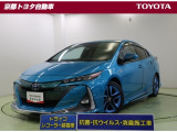 先進的なフロントマスクの【プリウスPHV】4人乗り。モデリスタフルエアロで精悍なスタイルです。コンセントから充電して走ることもガソリンで走ることもできます。
