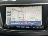 ナビ画面のアップ写真です。フルセグTV・Bluetoothオーディオ・CD・DVDビデオ再生が可能です。