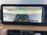 目視できないフードで隠れた路面の映像を表示するインビジブルフードビュー