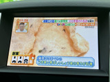 停車時にテレビ番組を視聴可能。移動時間も有意義に活用できます。家族みんなで楽しめるエンターテイメント空間を提供します。