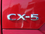 【CX-5】上質感と精悍さを兼ね備え、ワイド感を強調した意匠。オールラウンドな機能美と品格、洗練されたデザイン。