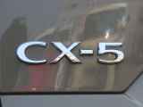 【CX-5】上質感と精悍さを兼ね備え、ワイド感を強調した意匠。オールラウンドな機能美と品格、洗練されたデザイン。