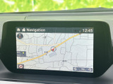 道路や現在地が画面上に表示され、周辺の位置関係を確認しやすい地図画面です。表示の縮尺も確認できるため、目的地までの道順を調べる際や、慣れない場所へ向かう際にも活用できます。