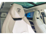Embroidered Lamborghini shield on headrest