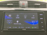 ナビやBluetooth Audio、TVなどのメニューが画面に表示され、目的の項目を確認しやすい構成です。音楽や案内の利用時も、表示を見ながら選べて日常の移動に便利です。