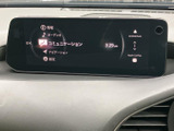 情報やオーディオ、ナビゲーションなどの項目が画面にまとまり、必要なメニューを確認しやすい表示です。スマートフォン連携の案内も確認できます。