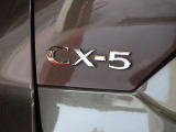 【CX-5】上質感と精悍さを兼ね備え、ワイド感を強調した意匠。オールラウンドな機能美と品格、洗練されたデザイン。