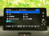 FMやAM、USB、Bluetooth Audioなど、複数の音源を一覧から選べる画面です。
