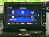 DVD/CDやラジオ、テレビ、SDなど複数の音源が一覧で表示され、使いたい項目を選びやすい画面です。日常の移動中も、お好みに合わせた音楽を楽しめます。